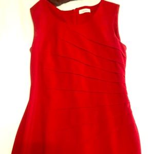 Red dress with side flattering ruching.